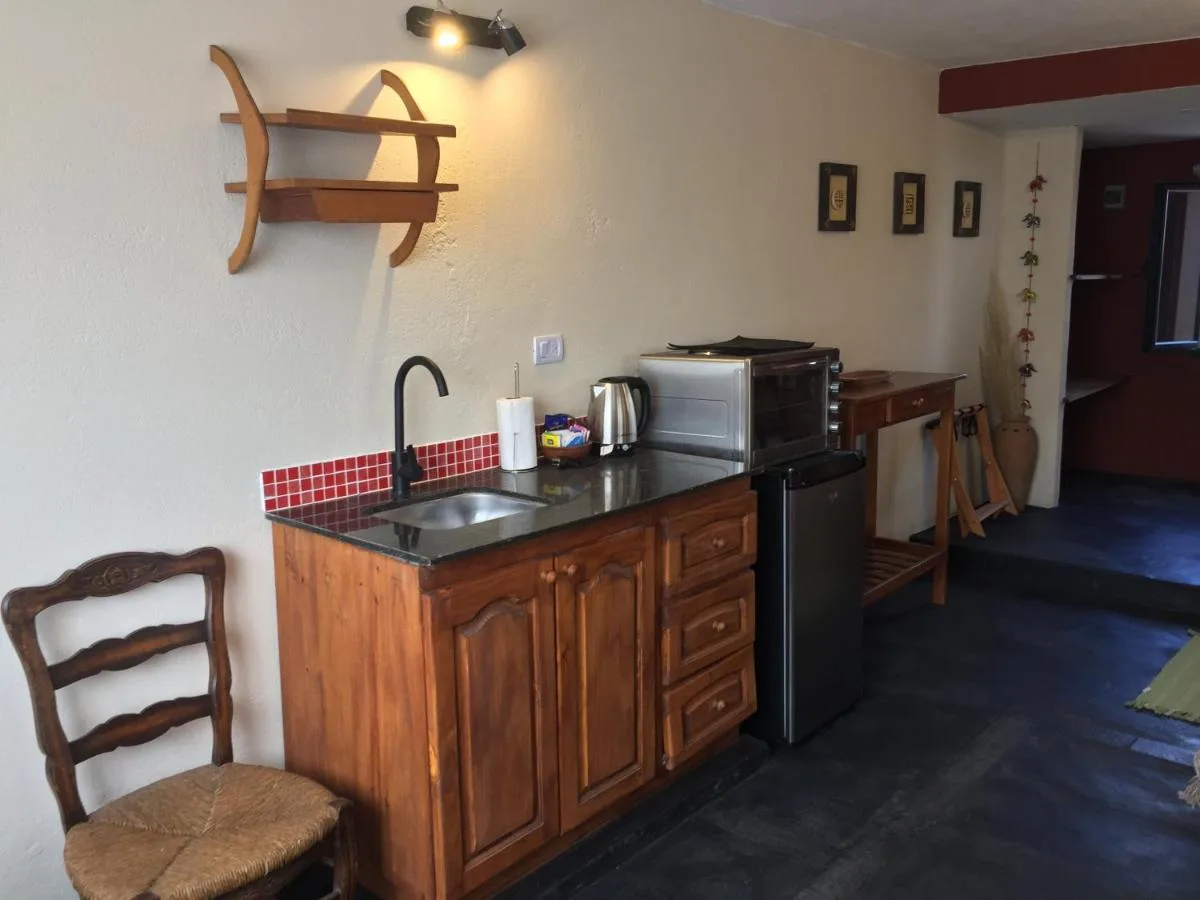 Cocina equipada del apartamento, Taos Pueblo, cabañas en Capilla del Monte