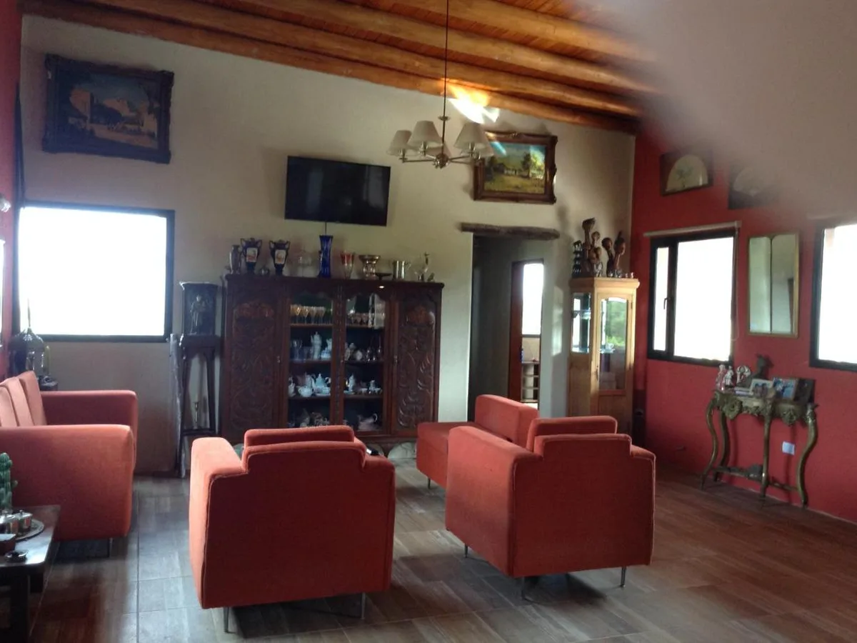 Living comedor del chalet, Taos Pueblo, cabañas en Capilla del Monte